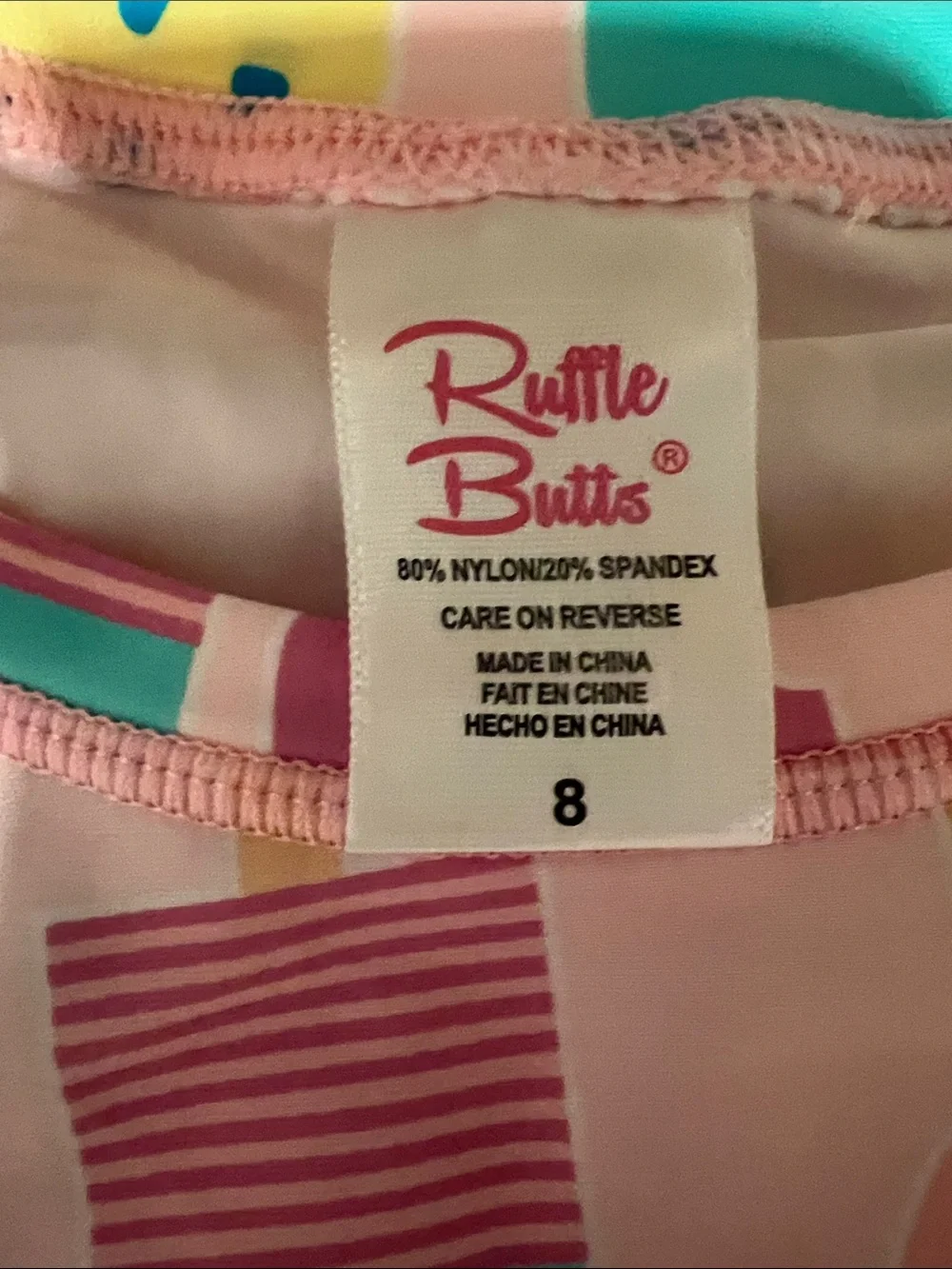 Ruffle Butts Girls Pink Popsicle/Ice Cream Print swim rash guard, size 8